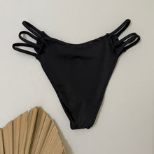 Load image into Gallery viewer, Black bikini bottom with side ties on a white background