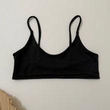 Load image into Gallery viewer, Black bralette swim top on a white background